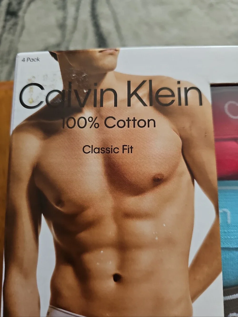 Calvin Klein 4-Pack Cotton XXL Briefs – White, Pink, Blue, Gray
